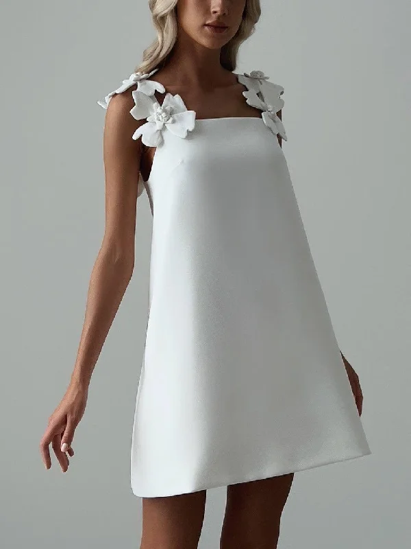 Elegant White Mini Dress with Floral Shoulder Detail